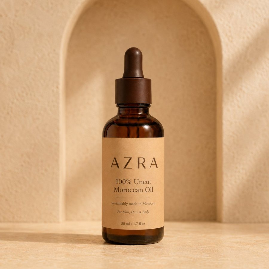 AZRA bottle standing in a softly lit arched plaster niche
