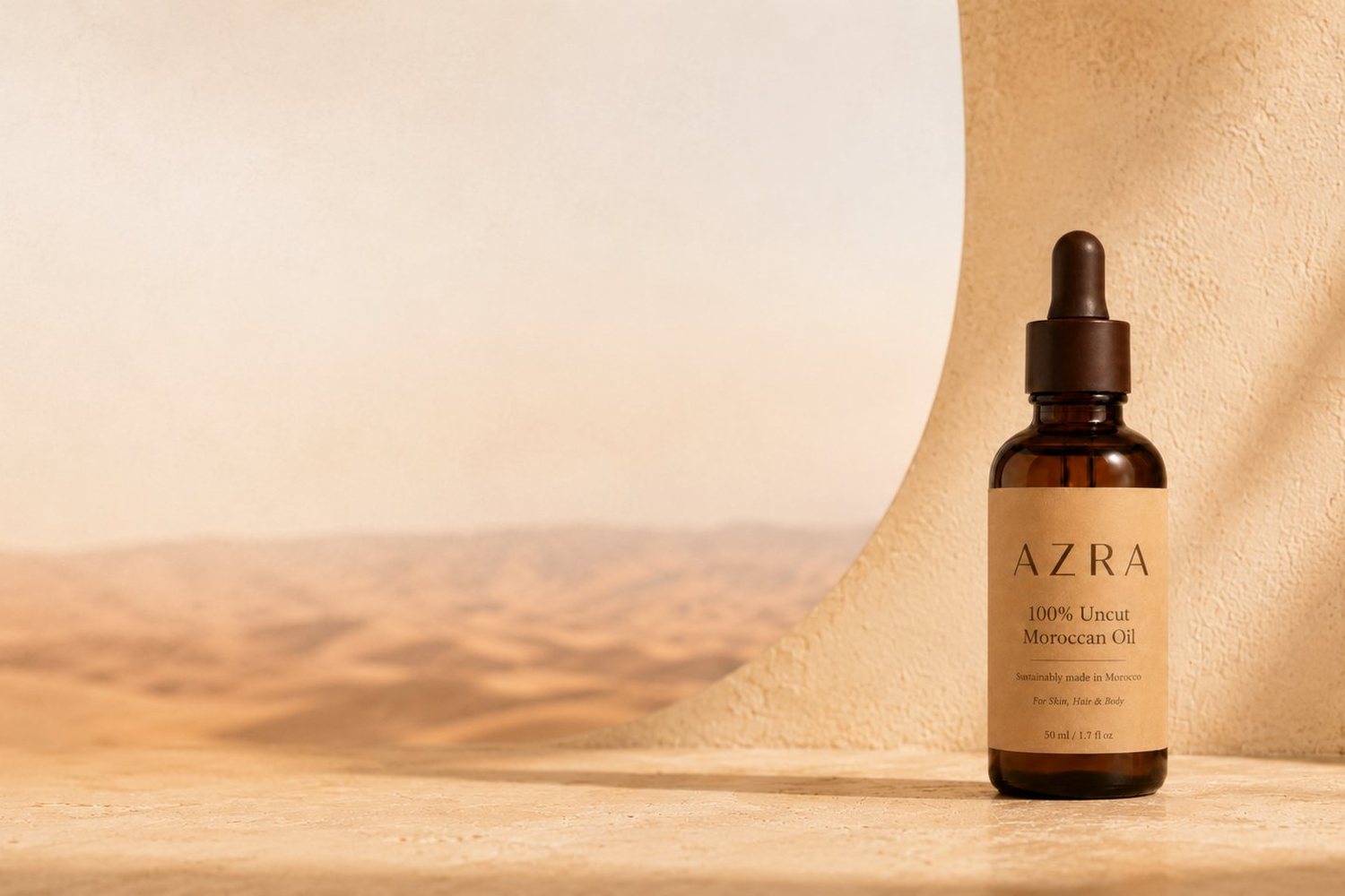 AZRA bottle beside a sunlit Moroccan dune seen through a curved opening