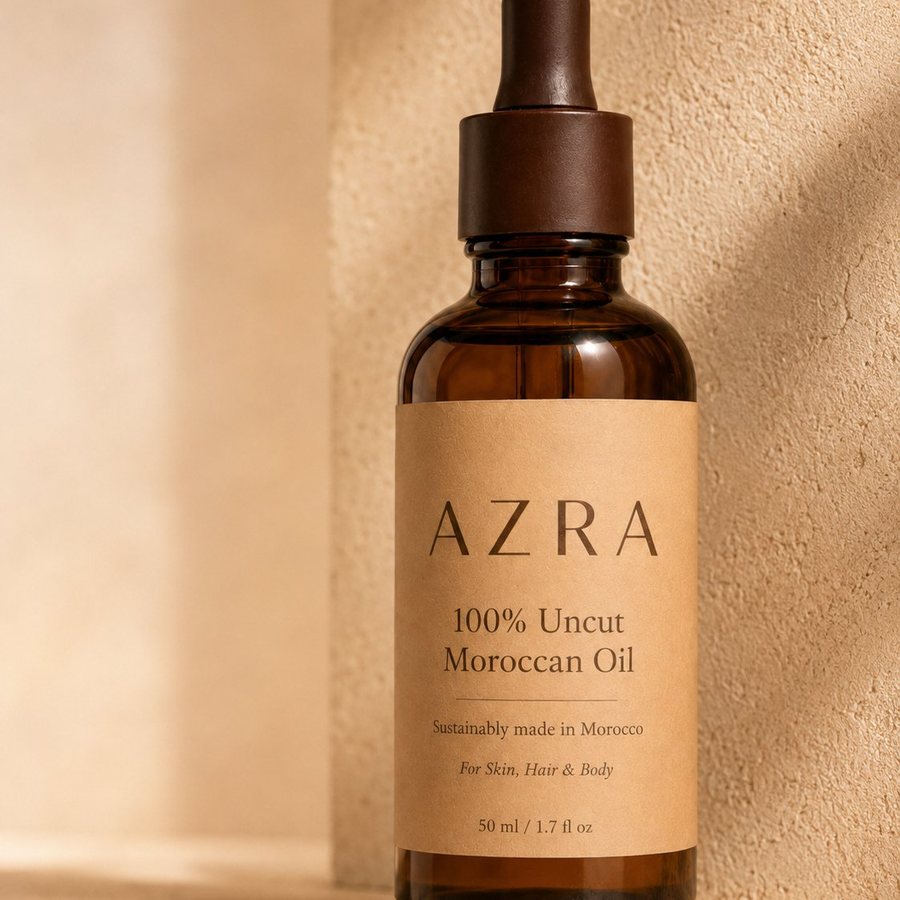 Close view of the AZRA kraft label reading 100% Uncut Moroccan Oil, for skin, hair and body, 50 ml